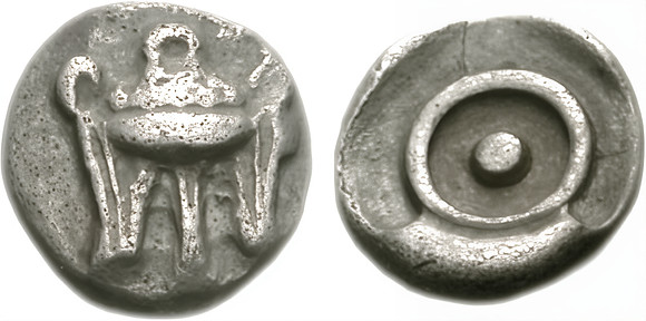 Silver Obol with short tripod + pellet within circle (omphalos or phiale); all within incuse square. Phokis, Delphi. Circa 480 BC.