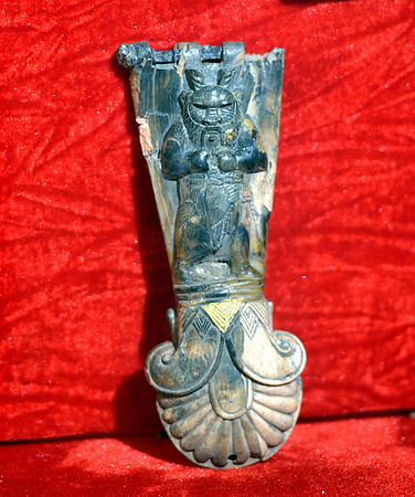 Carved ivory from Nimrud (Kalhu), horse frontlet showing god Bes, 9th to 7th century BCE. From Nimrud, Iraq.