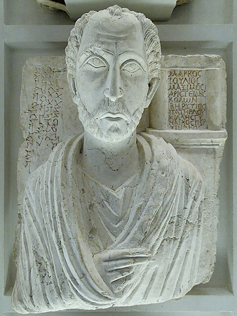 Palmyrenian relief representing a man named Marcus, colonist in Berytos; bilingual inscription is Palmyrenian and Greek (circa late 2nd–early 3rd century AD)