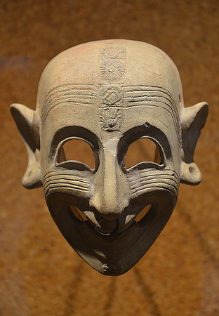 Phoenician grinning mask (circa 4th century BC)