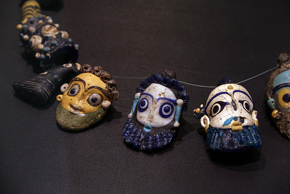 Phoenician glass necklace faces (circa 4th century BC)