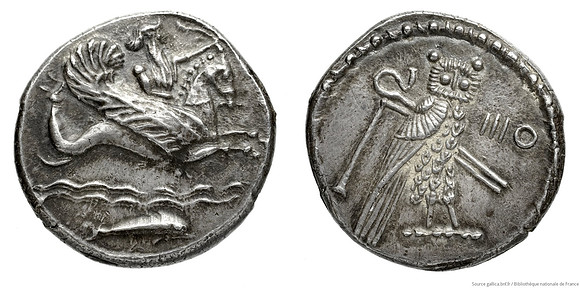 Silver coin of Tyre minted in the Phoenician city of Acre, featuring Phoenician god Melqart (obverse) and Egyptian owl (reverse) (circa 347-346 BC)