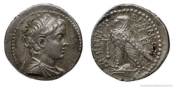 Silver didrachme coin minted at the Phoenician city of Tyre, featuring a bust of King Demetrios II Nikator (obverse) and an eagle (reverse) (circa 142-141 BC)