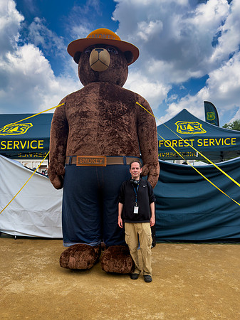 Posing with Smokey Bear at the Great American State Fair