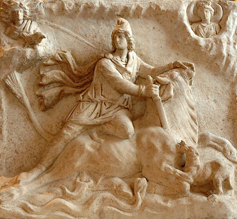Marble relief featuring Mithras slaying a bull under the auspices of Sol (top left) and Luna (top right)