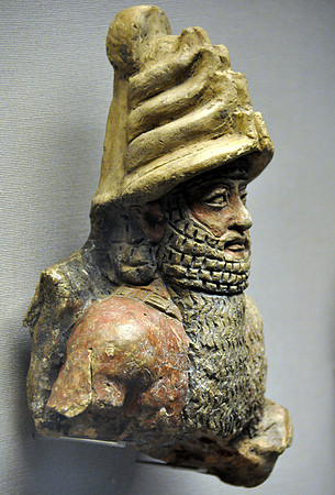Fired clay statue of a seated god, probably Shamash (Babylonian circa 2000-1750 BCE)