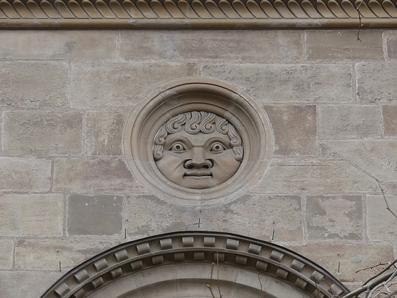 The "head of Apollo" at the Saint Pierre Cathedral in Geneva