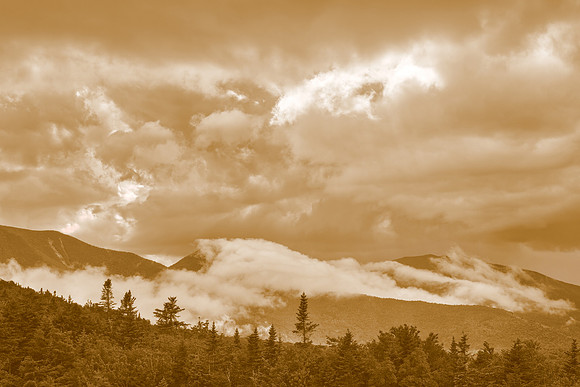 Glowing Sepia Mountain Clouds